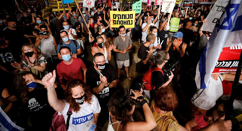 Израильтяне протестуют против политики правительства во время карантина - Фото