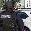 В Грузии вооруженный мужчина захватил заложников в банке и потребовал $500 тысяч - Фото