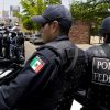 В Мексике 12 полицейских были арестованы по подозрению в убийстве 19 человек - Фото
